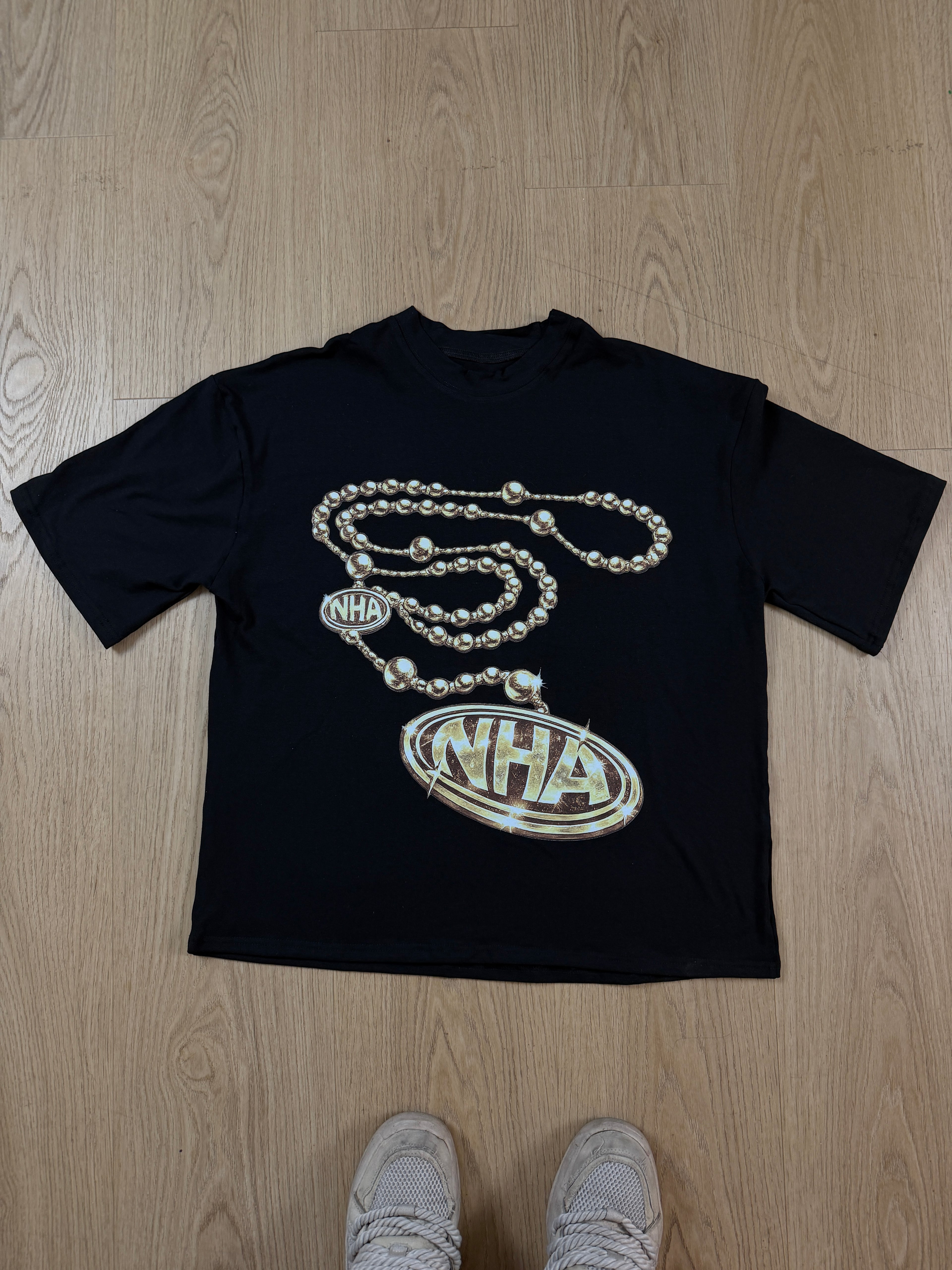 Remera Boxy Colgante Oro