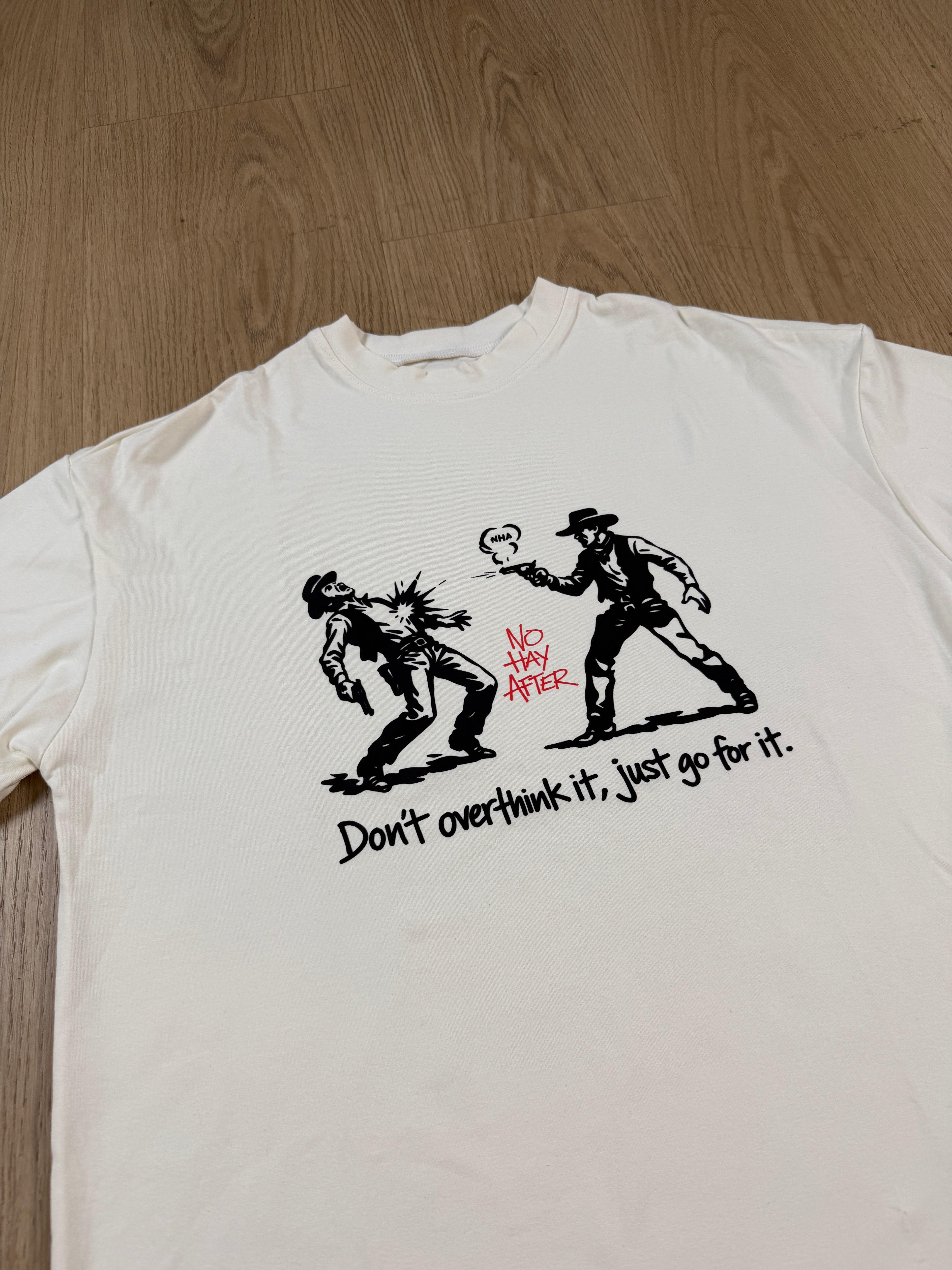 Remera Boxy Crema "Dispara"