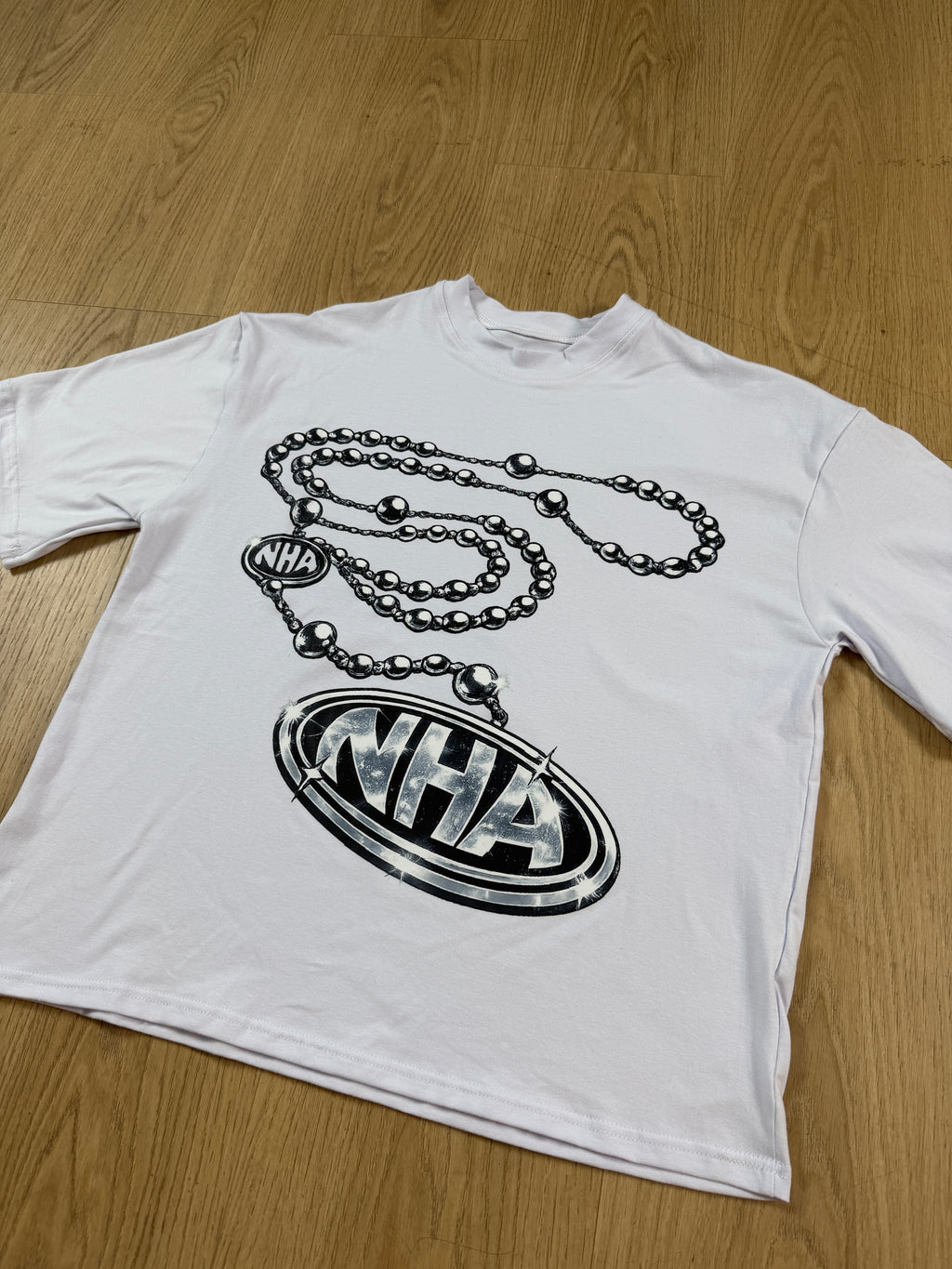 Remera Boxy Colgante Plateado